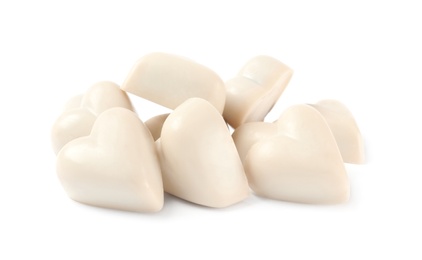 Photo of Beautiful heart shaped chocolate candies on white background