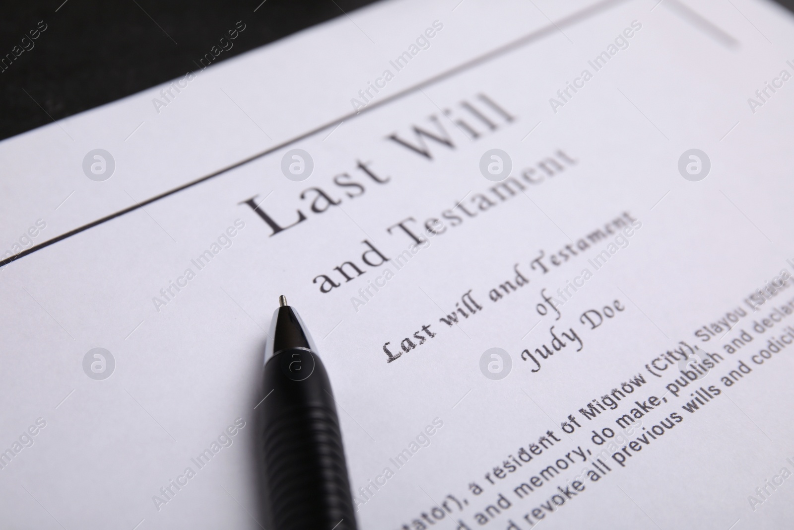 Photo of Pen on last will and testament, closeup