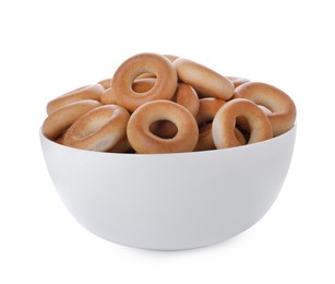 Bowl with tasty dry bagels (sushki) isolated on white