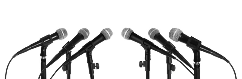 Image of Set of different microphones on white background