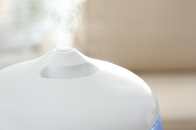 Modern air humidifier at home, closeup view