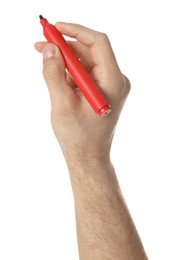 Man holding red marker on white background, closeup