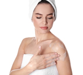 Young woman washing body with soap on white background