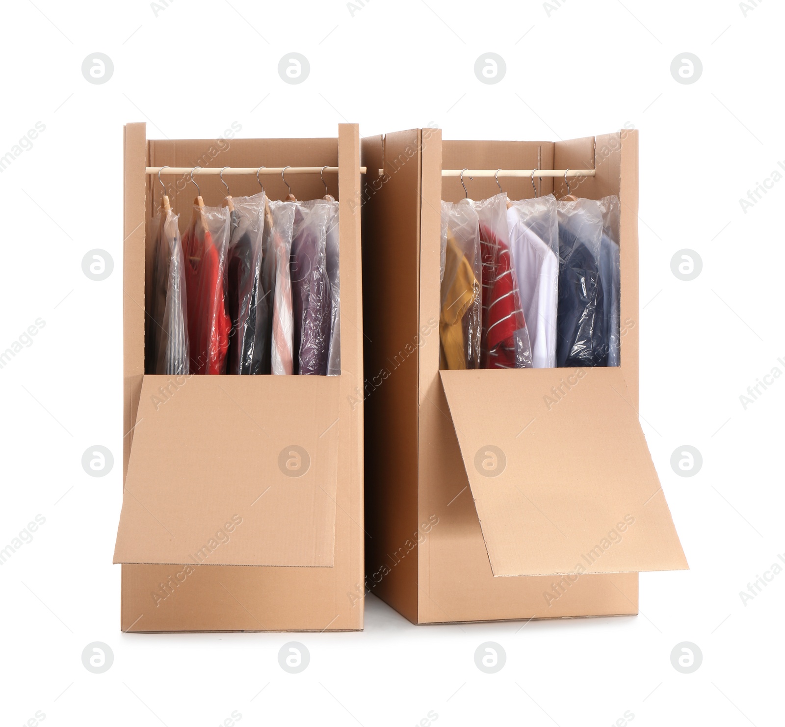 Photo of Wardrobe boxes with clothes on white background