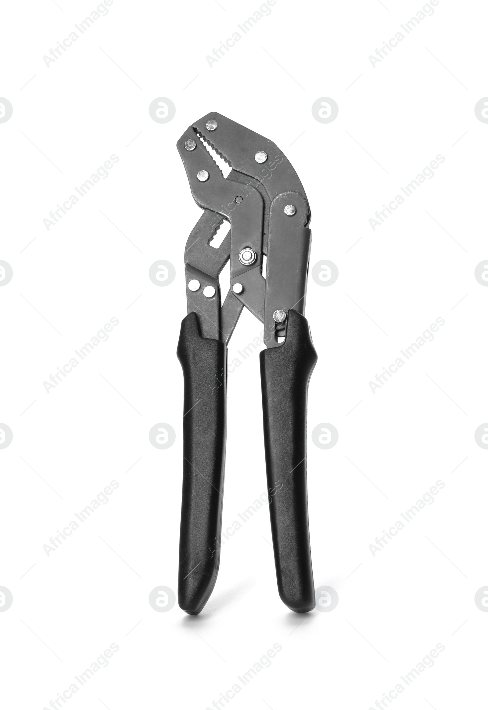 Photo of New pliers on white background. Professional construction tool