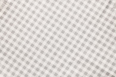 Photo of Beige checkered tablecloth as background, top view