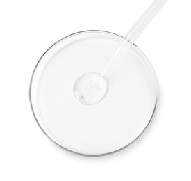Photo of Glass pipette and petri dish with liquid on white background, top view