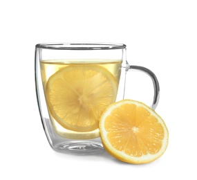 Glass cup with hot tea and lemon on white background