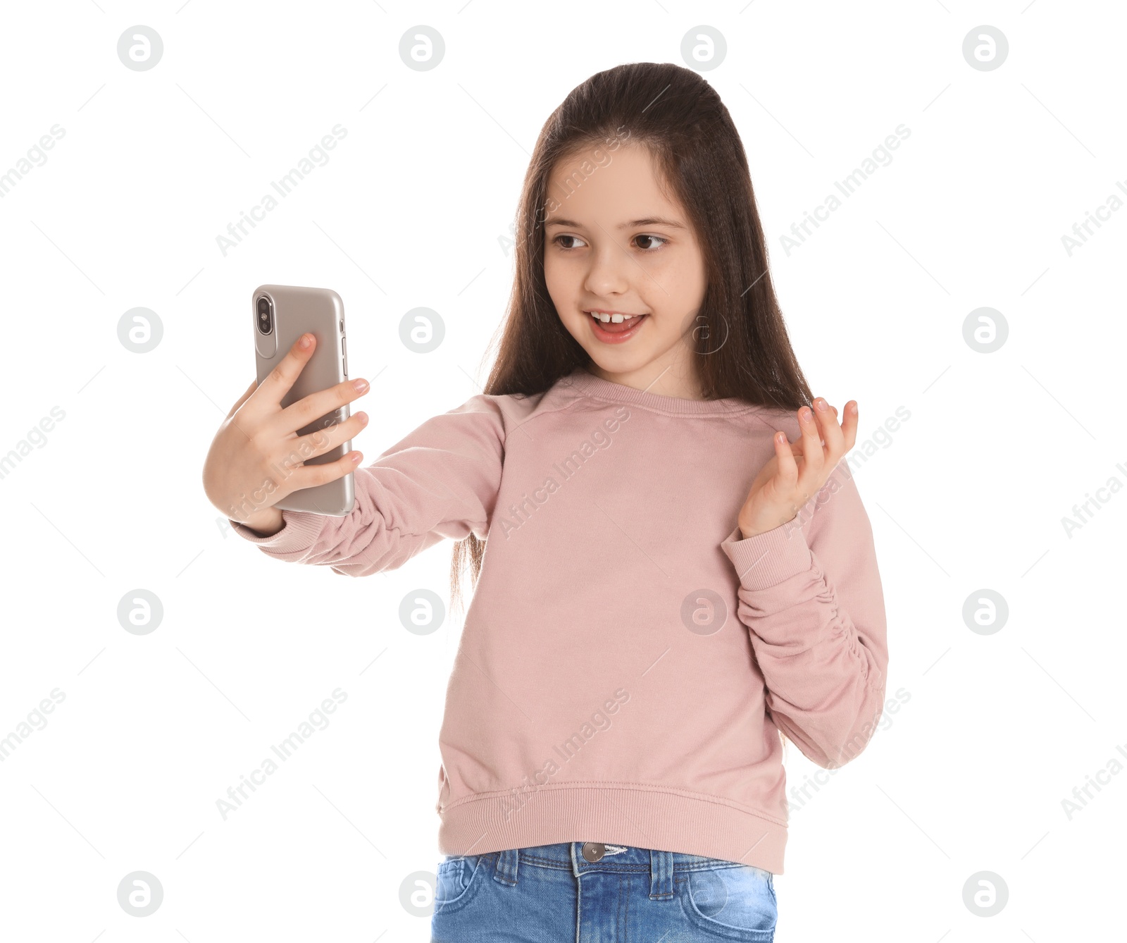 Photo of Little girl using video chat on smartphone against white background