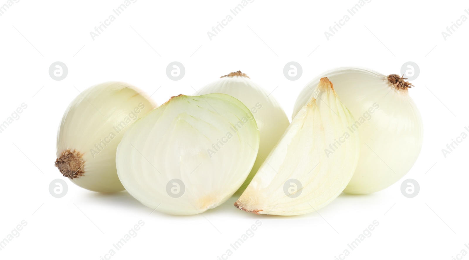 Photo of Fresh peeled onion bulbs on white background