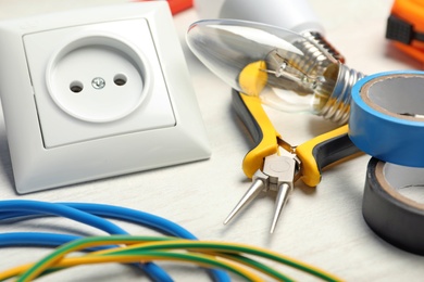 Photo of Set of electrician's tools on light table