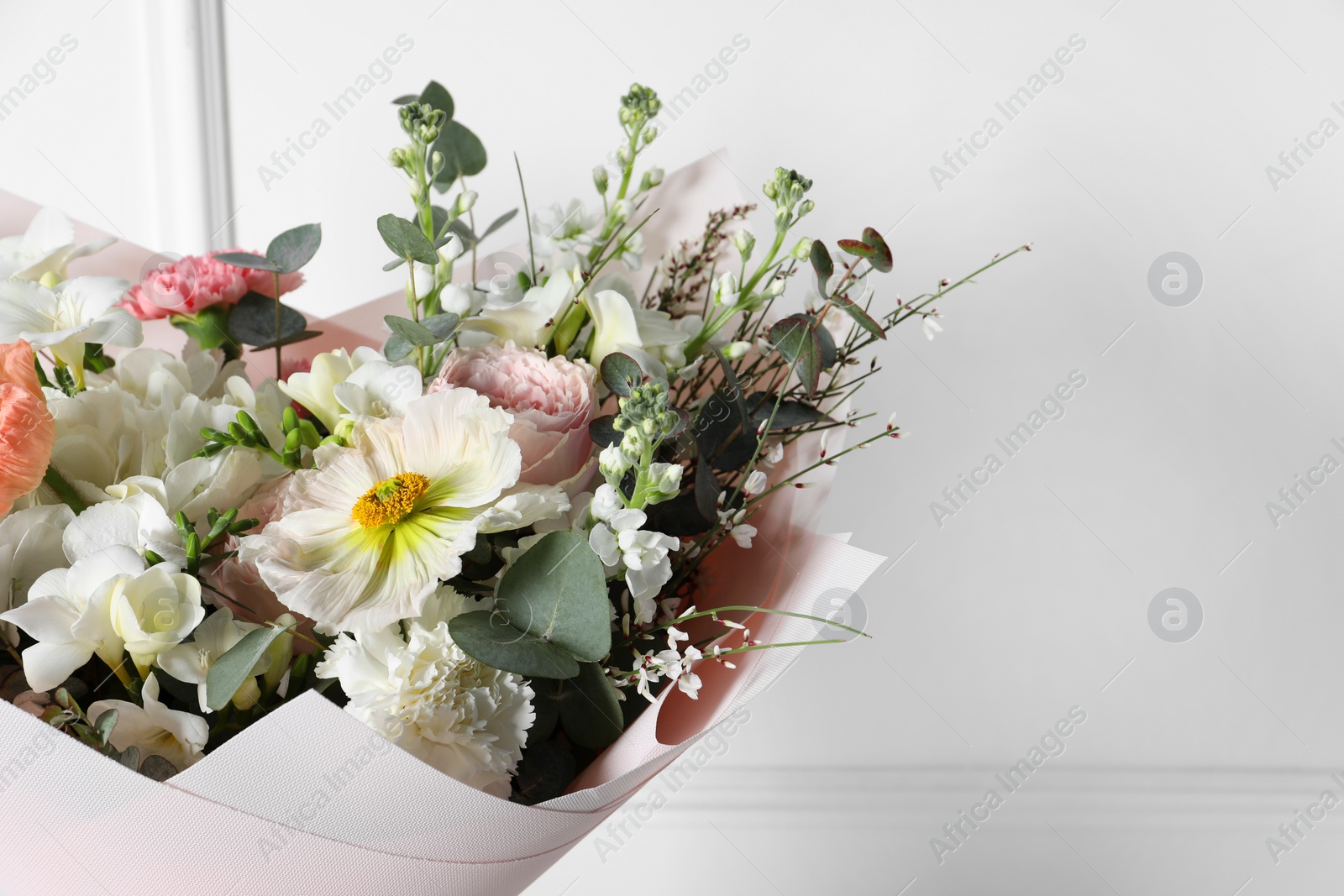 Photo of Bouquet of beautiful flowers on white background, closeup. Space for text