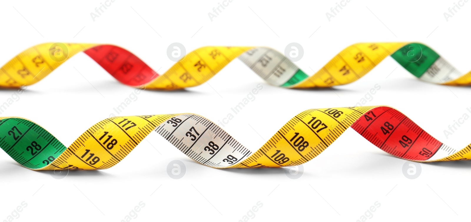 Photo of Measuring tape on white background