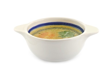 Delicious chicken bouillon with parsley in bowl on white background