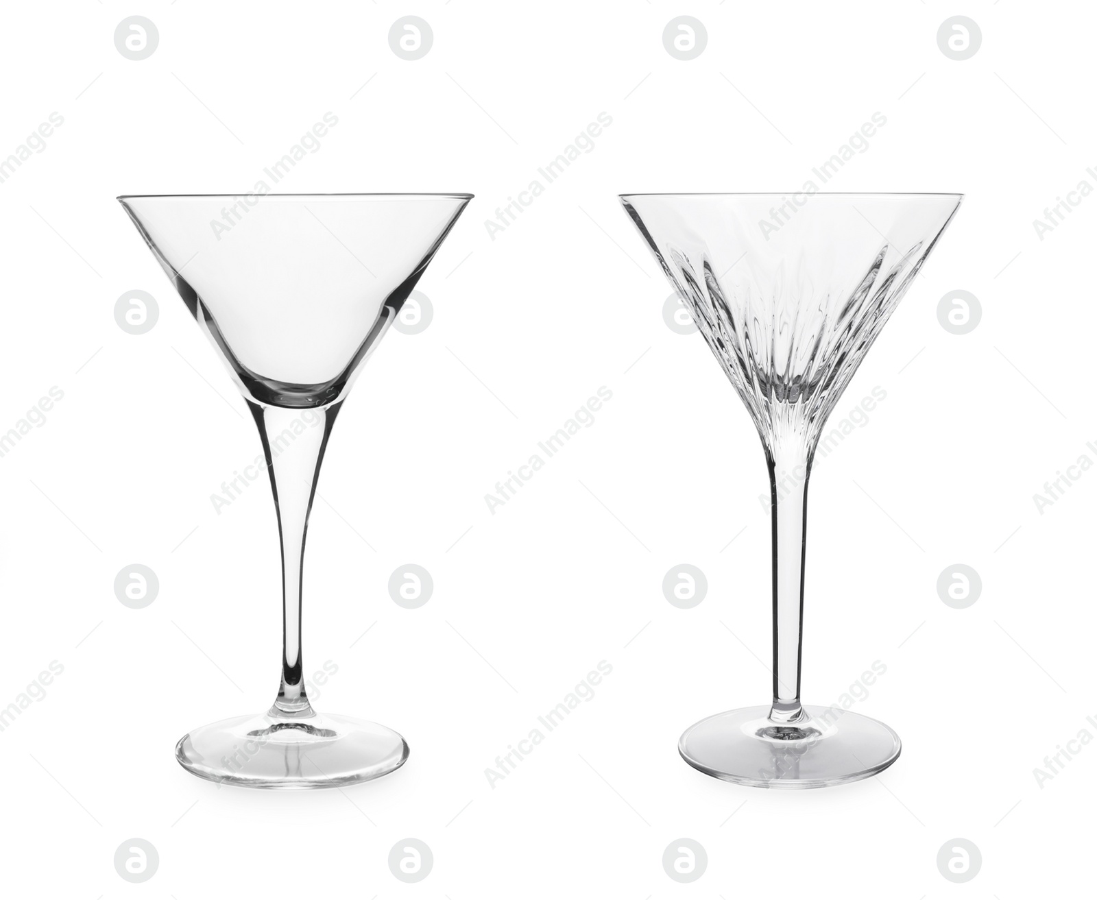 Image of Two beautiful empty martini glasses on white background