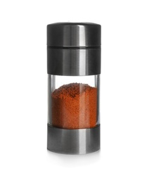 Photo of Shaker with aromatic pepper on white background