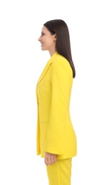 Photo of Businesswoman in yellow suit standing on white background