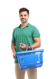 Young man with empty shopping basket isolated on white