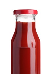 Glass bottle of tasty ketchup isolated on white