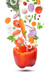 Image of Stuffed pepper recipe. Fresh ingredients falling into bell pepper on white background