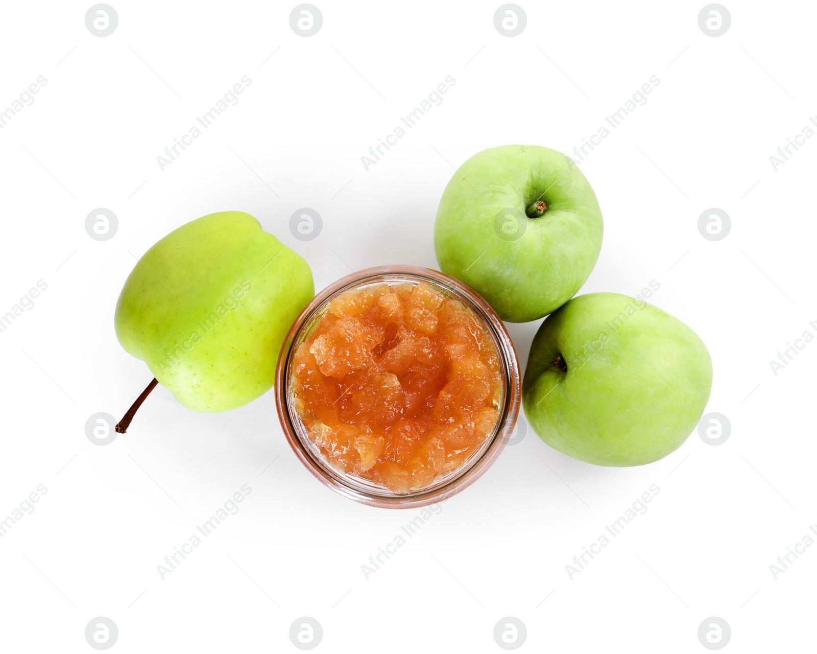 Photo of Glass jar of delicious apple jam and fresh fruits isolated on white, top view