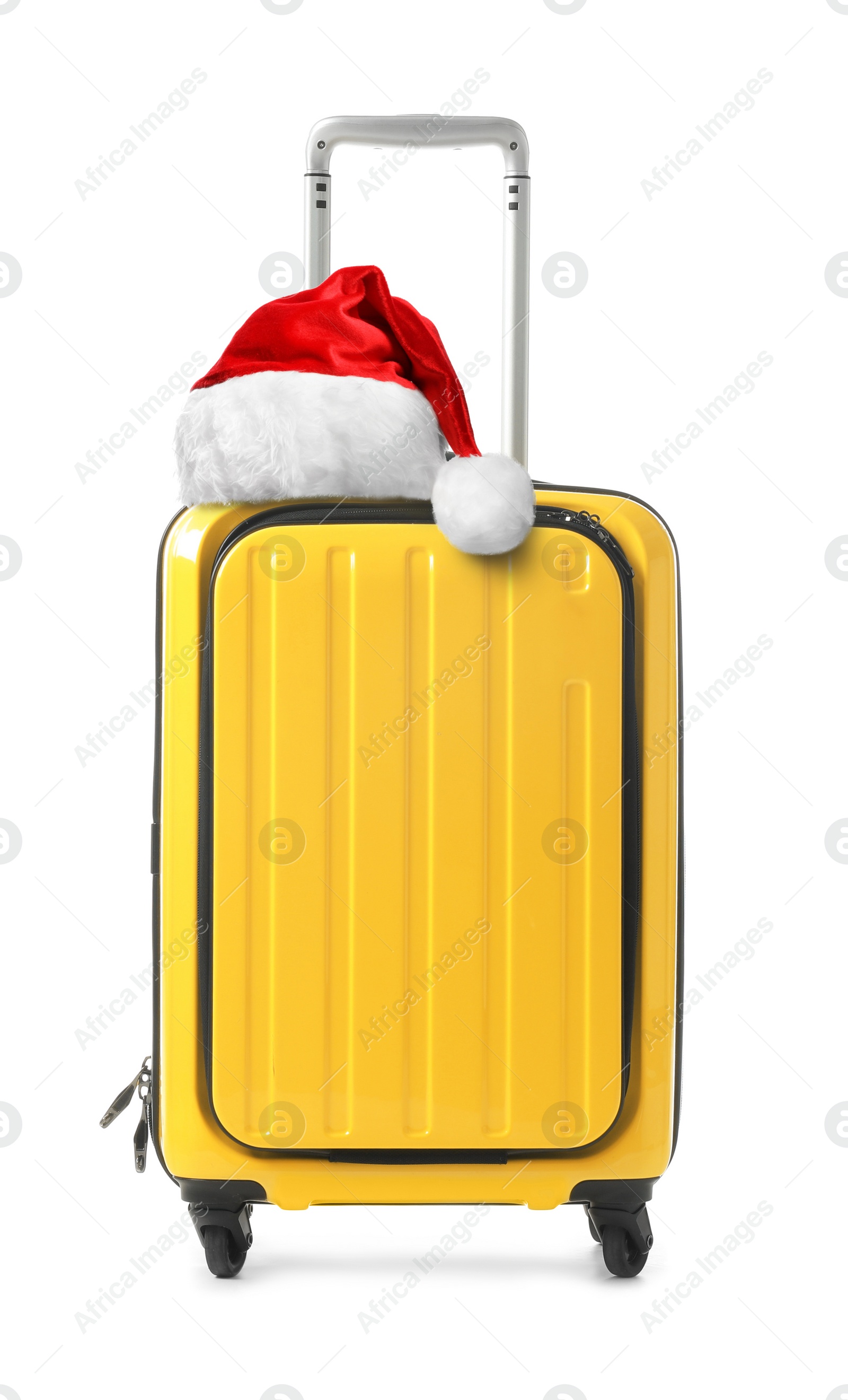 Image of Stylish suitcase with Santa Claus hat isolated on white. Christmas vacation 