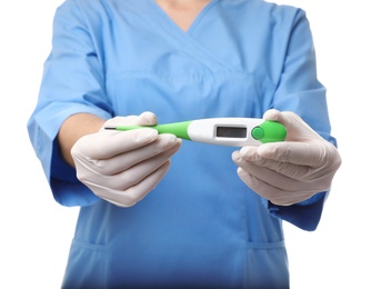 Female doctor holding digital thermometer on white background, closeup. Medical object