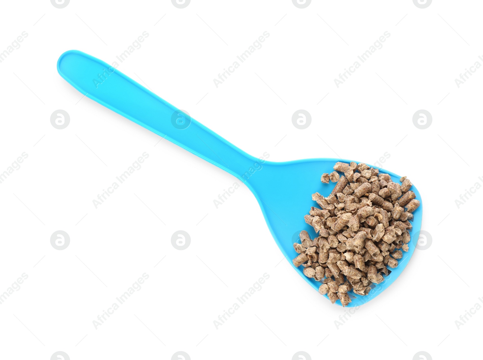 Photo of Light blue plastic scoop with cat litter isolated on white, top view