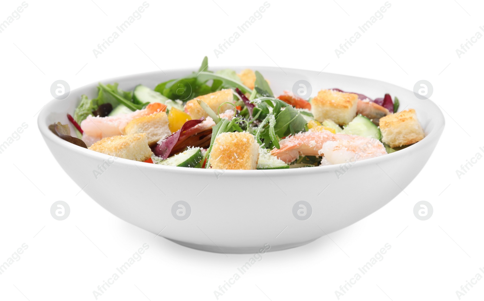 Photo of Delicious salad with croutons, cucumber and shrimp isolated on white