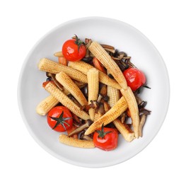 Photo of Tasty roasted baby corn with tomatoes and mushrooms isolated on white, top view