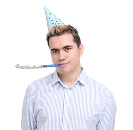 Photo of Young man with party hat and blower on white background