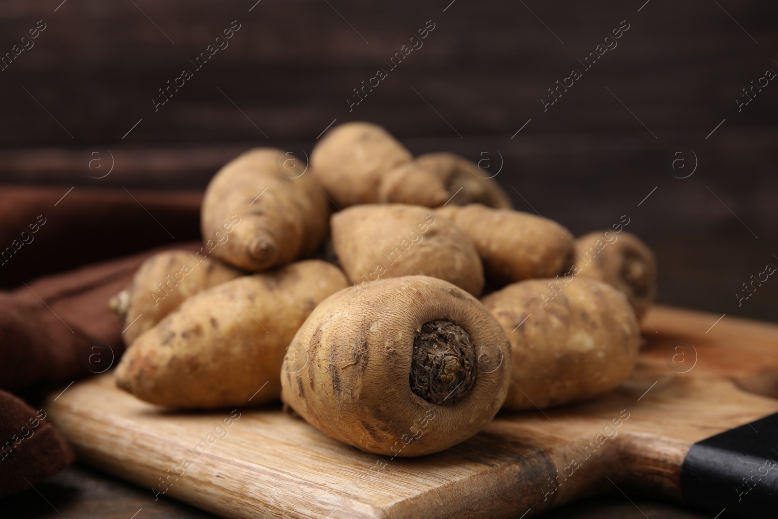 Photo of Tubers of turnip rooted chervil on table, closeup