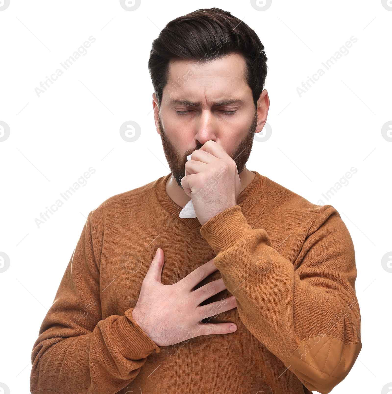 Photo of Sick man with tissue coughing on white background