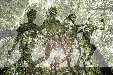 Image of Double exposure of running children and forest