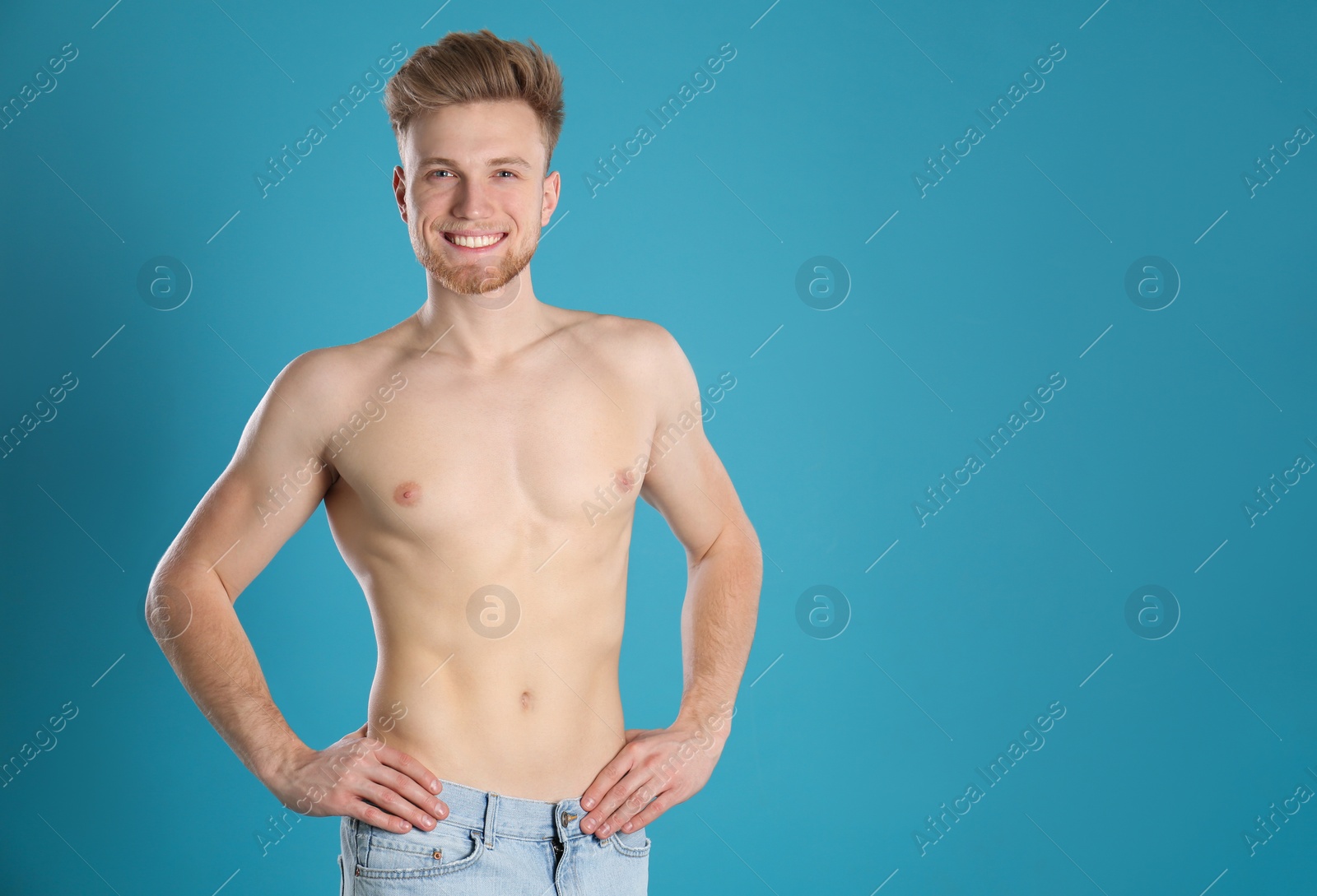 Photo of Handsome man with slim body on color background. Space for text