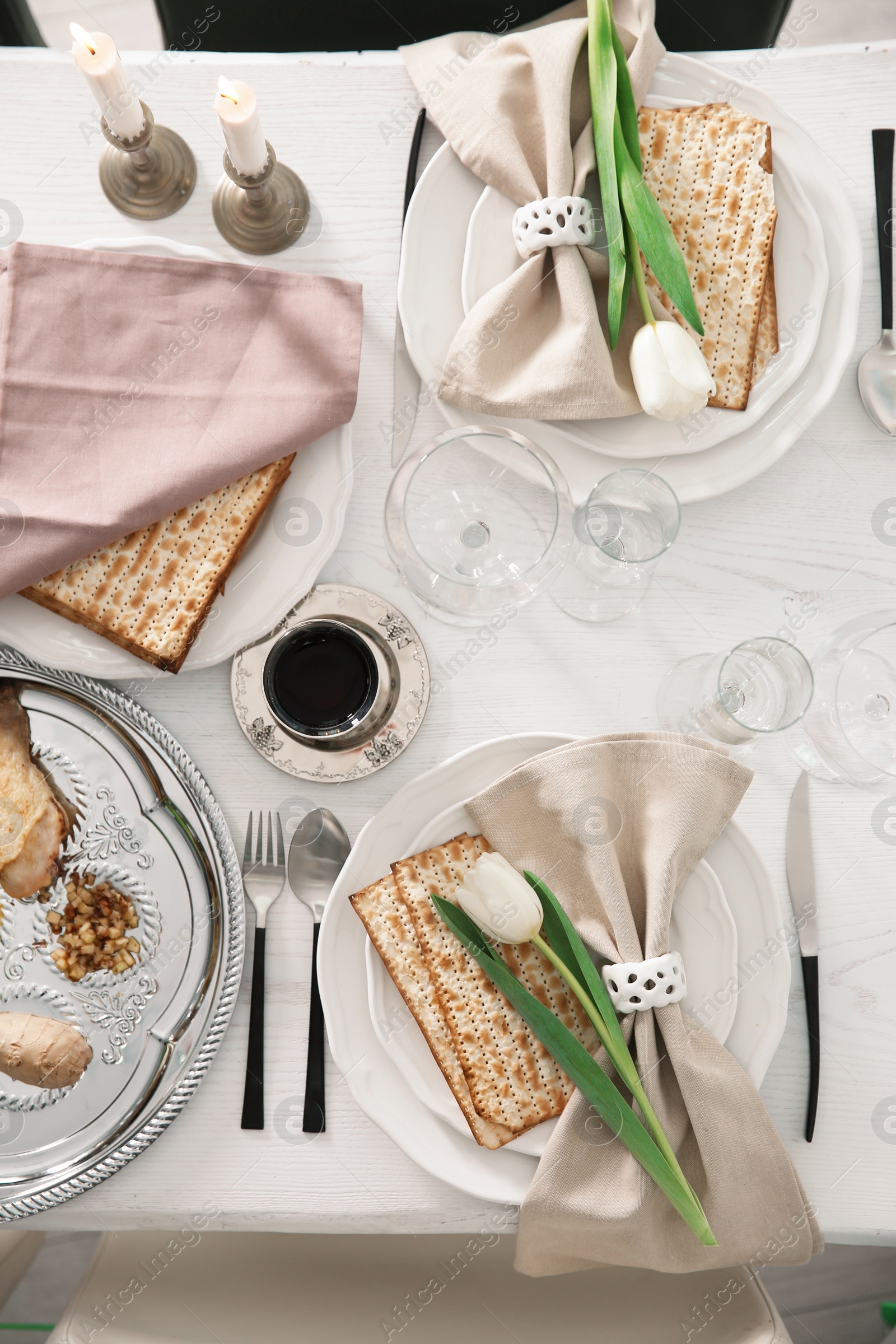 Photo of Festive Passover table setting, top view. Pesach celebration