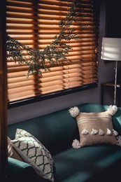 Photo of Stylish room decorated with beautiful eucalyptus garland