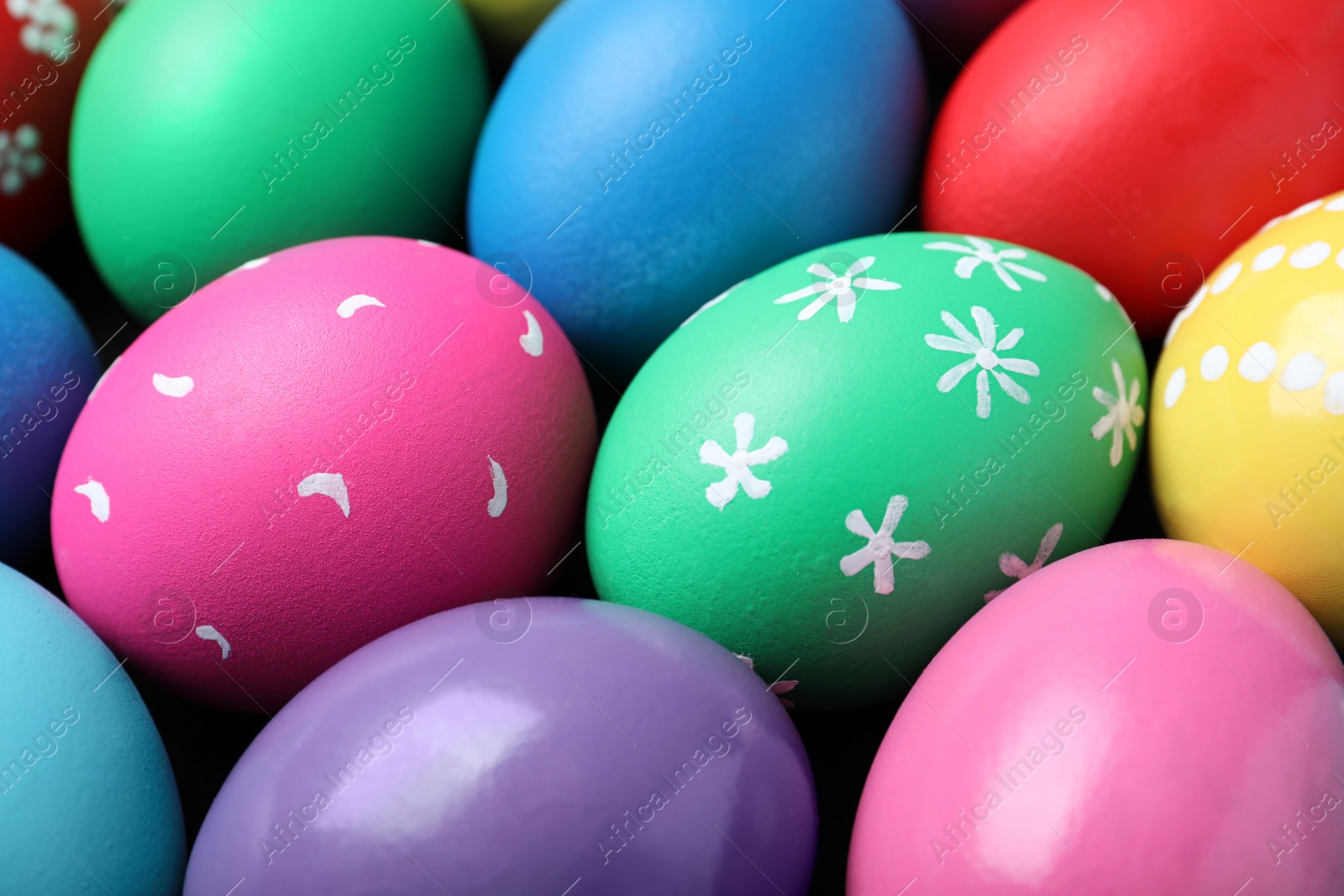 Photo of Colorful eggs as background, closeup. Happy Easter