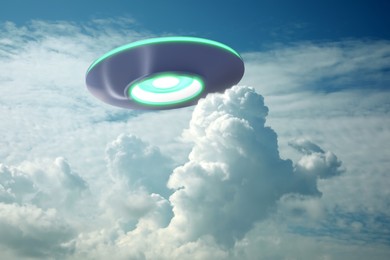 Image of UFO. Alien spaceship among clouds in sky. Extraterrestrial visitors