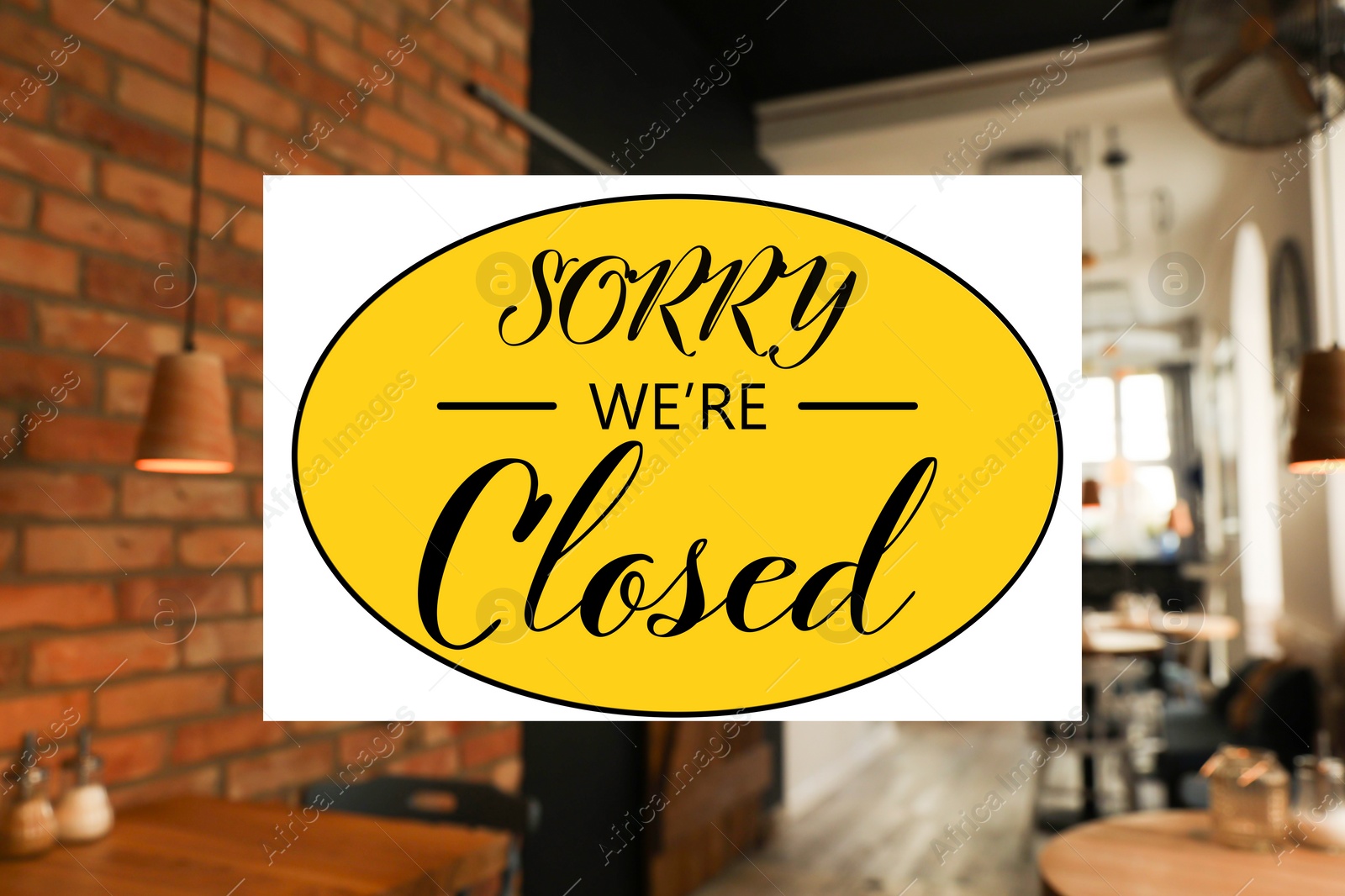 Image of Sorry we are closed sign against blurred background