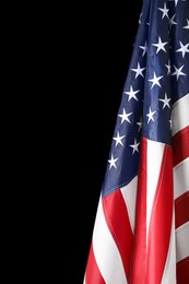 Photo of American flag on black background, closeup. Memorial Day