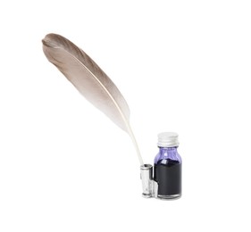 Photo of Feather pen and bottle of ink on white background