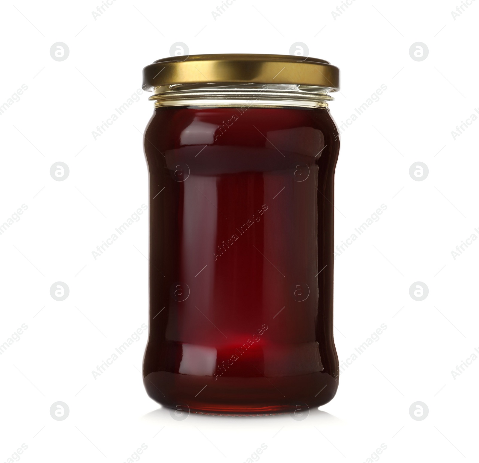 Photo of Jar with organic honey isolated on white