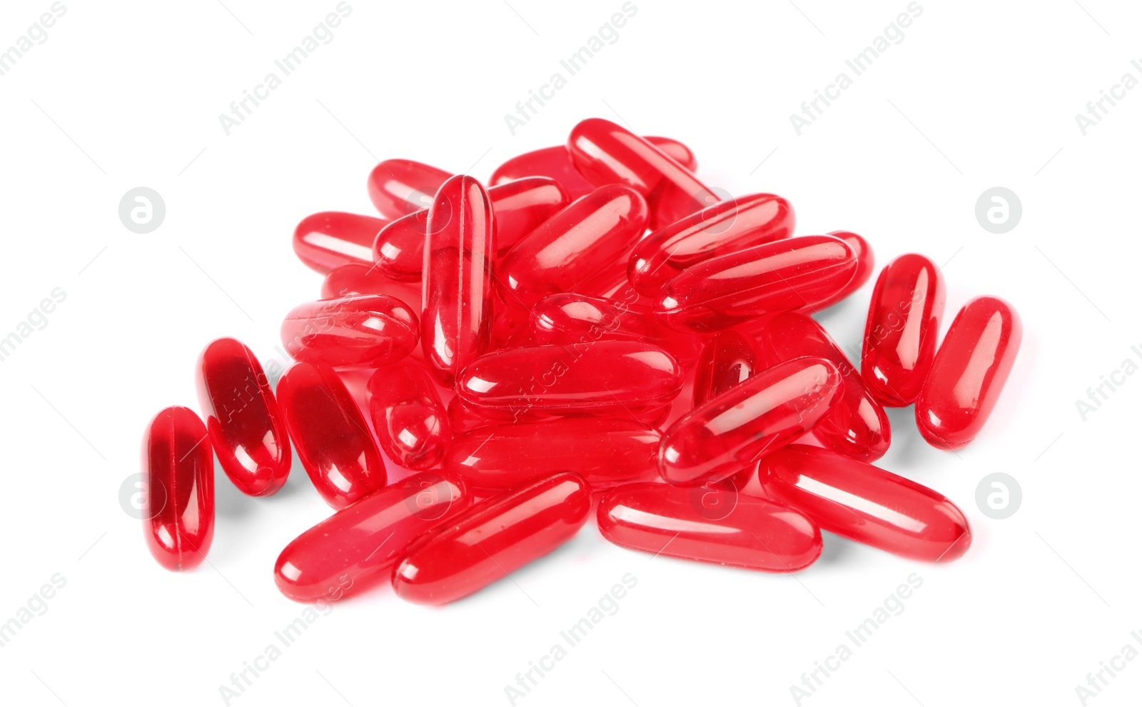 Photo of Pile of red pills on white background