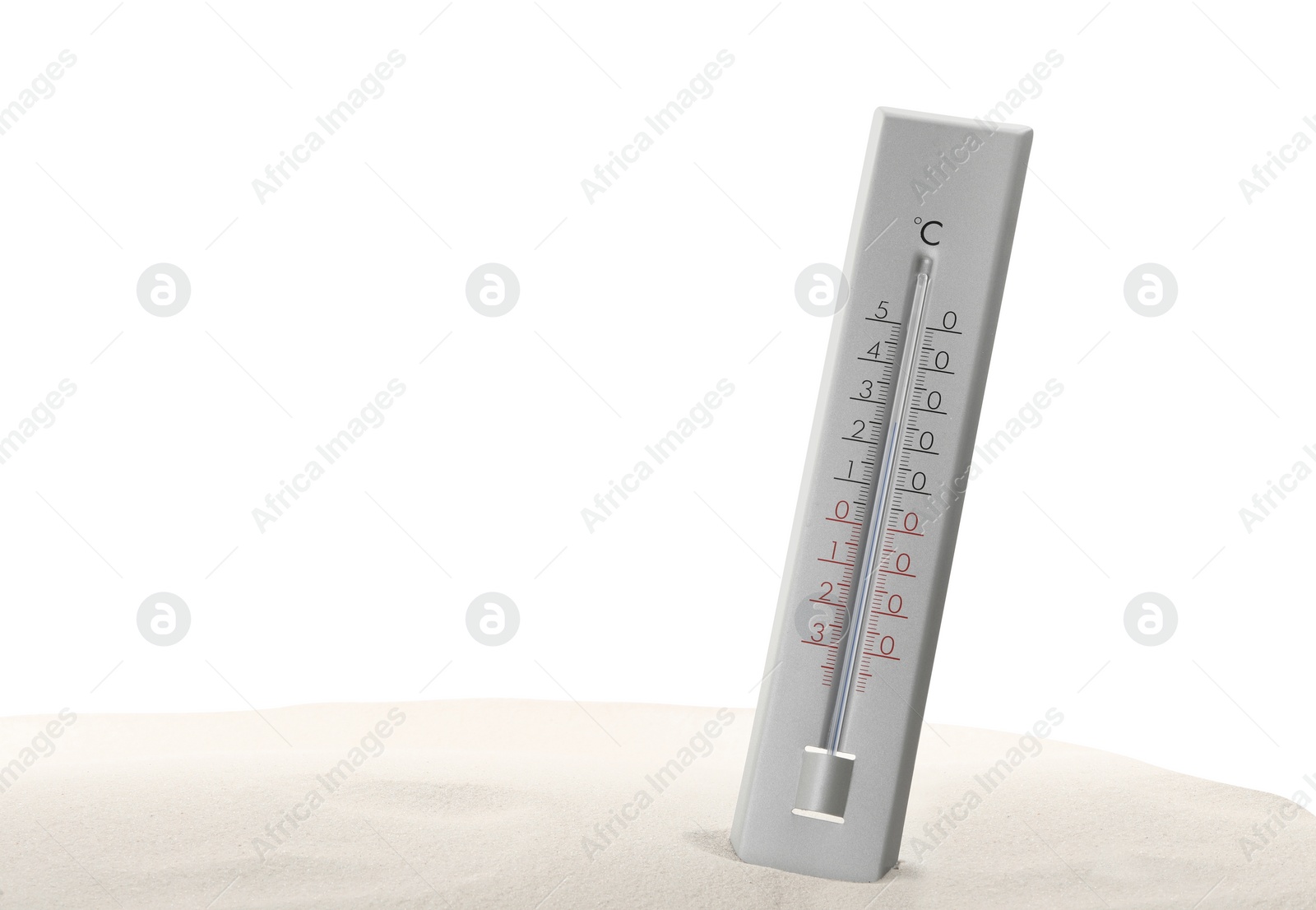 Photo of Weather thermometer in sand against white background