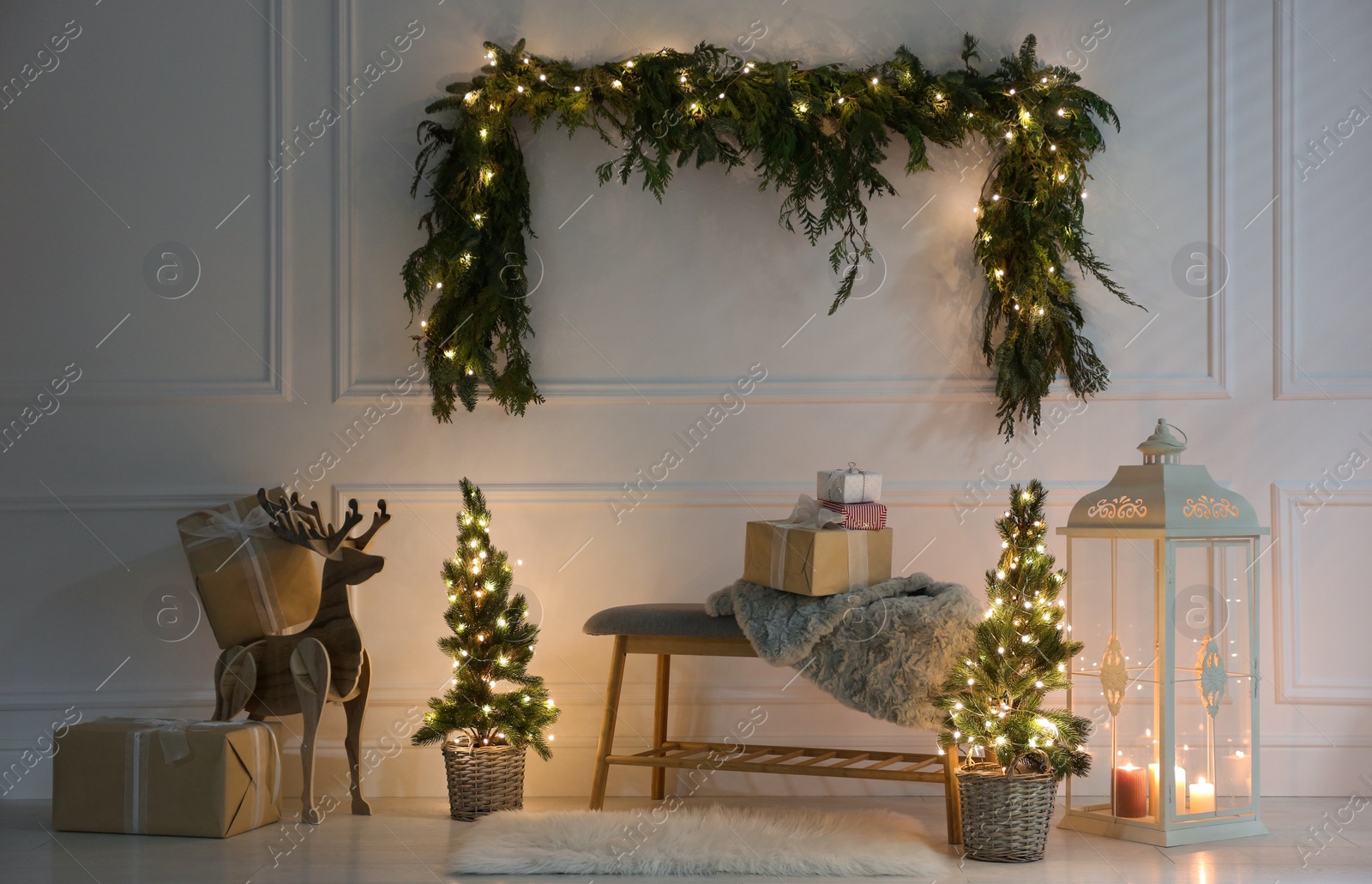 Photo of Beautiful Christmas themed photo zone with fir decor