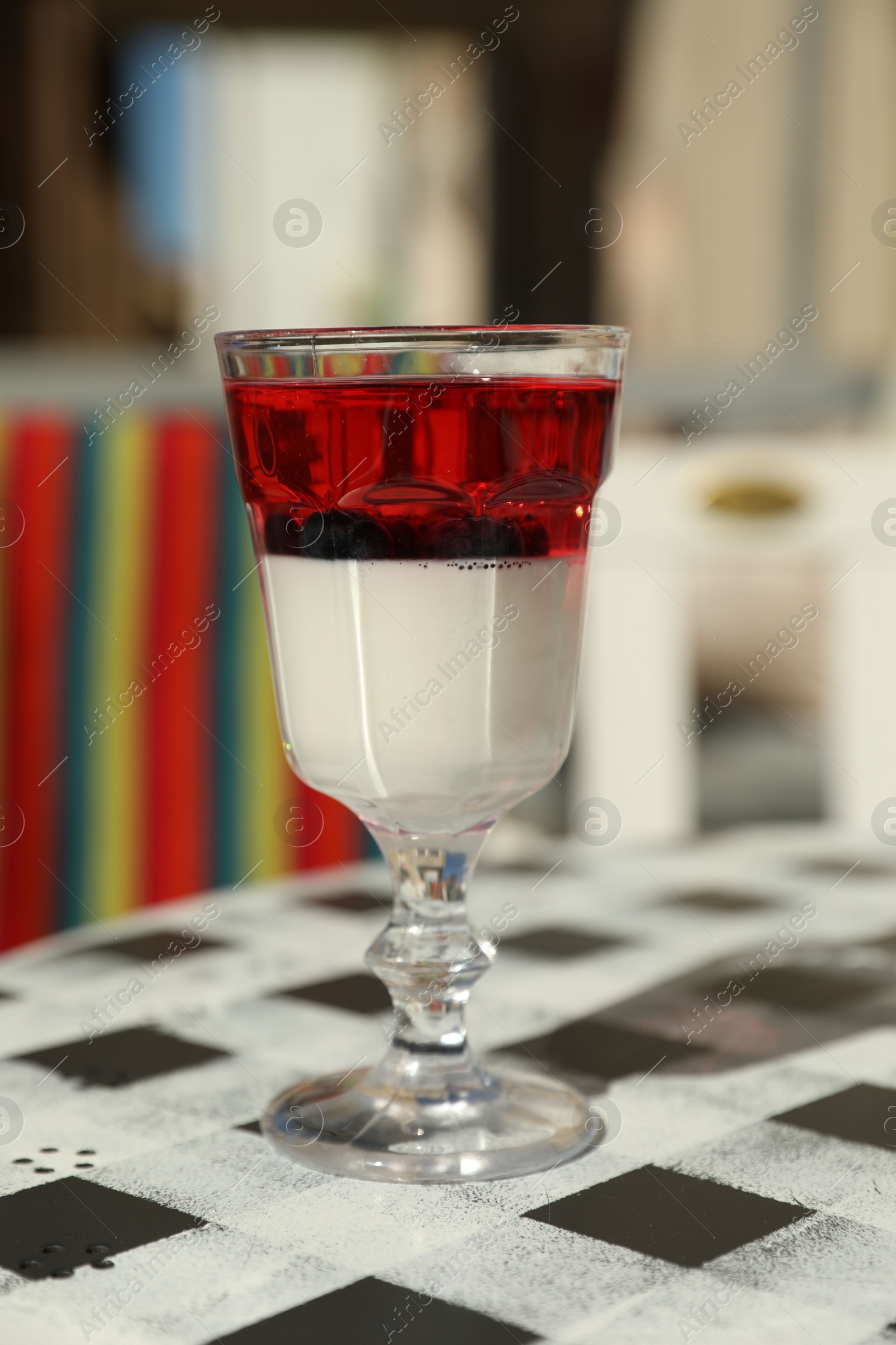 Photo of Delicious panna cotta dessert on table in cafe