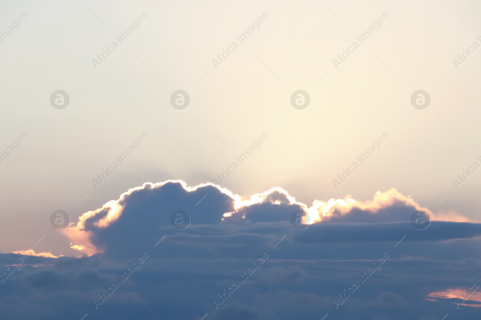 Photo of Picturesque view of beautiful blue sky with clouds at sunset