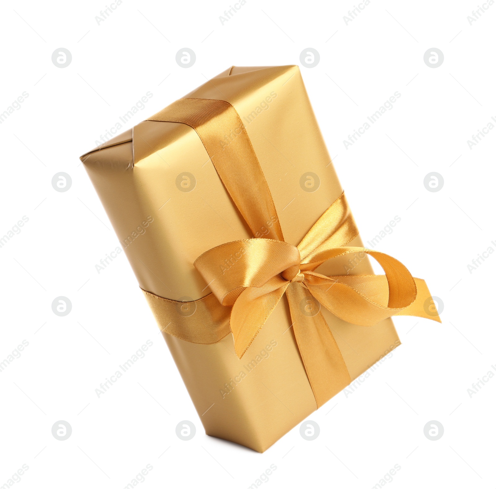 Photo of Gift box with golden ribbon and bow on white background