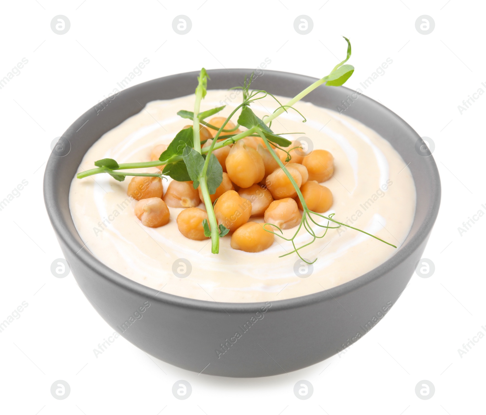 Photo of Tasty chickpea soup in bowl on white background